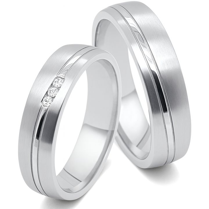 Moderne Partnerringe aus Titan und Edelstahl mit Zirkonia im Damenring