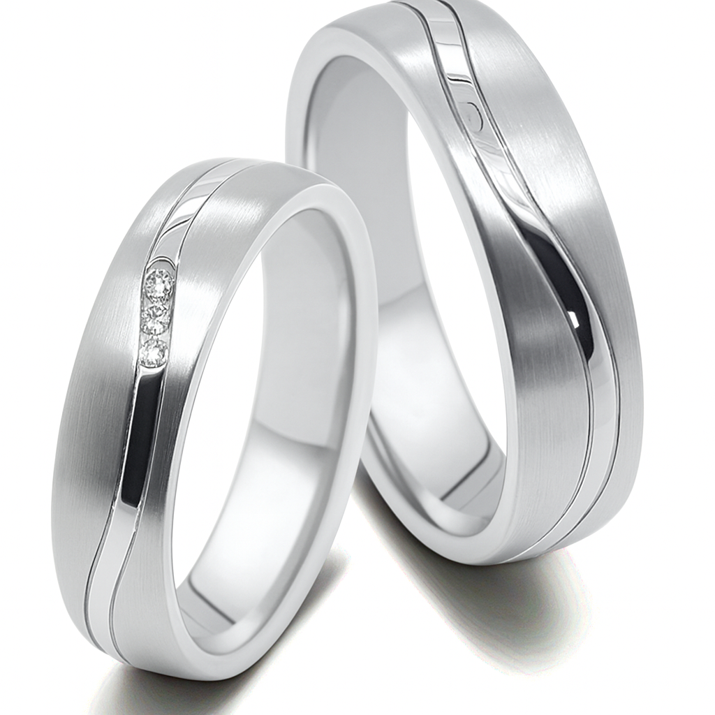 Moderne Partnerringe aus Titan und Edelstahl mit Zirkonia im Damenring