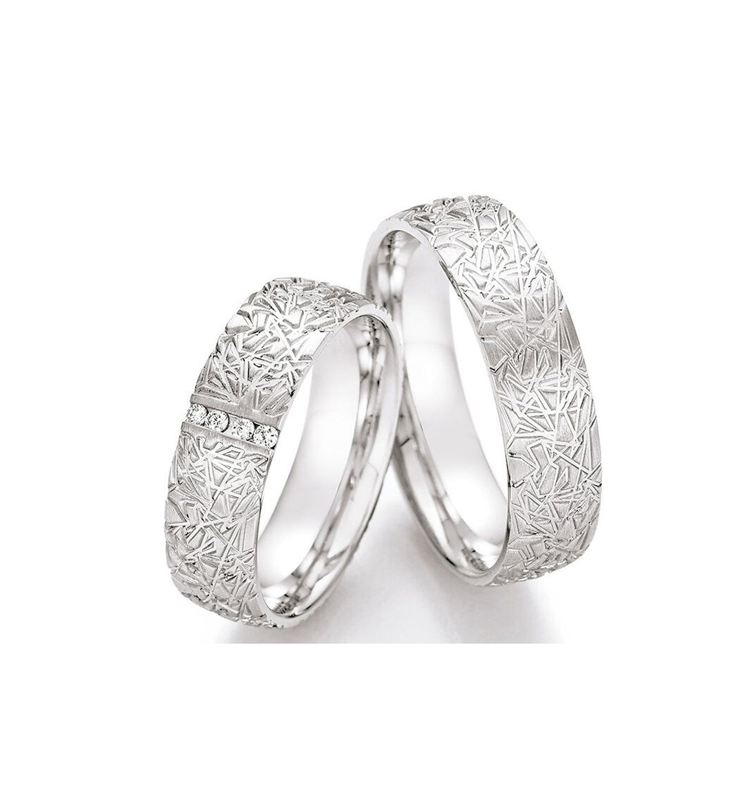 Detailansicht der Eheringe aus 925 Sterlingsilber mit Diamant und hochwertiger Verarbeitung